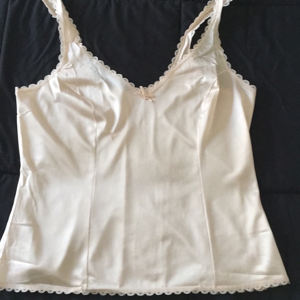 Luscious pink camisole with lace trim.